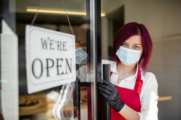 istock Young woman reopening her bakery during Corona virus 1279942138
