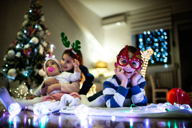 istock Happy children on Christmas Eve 1279948022