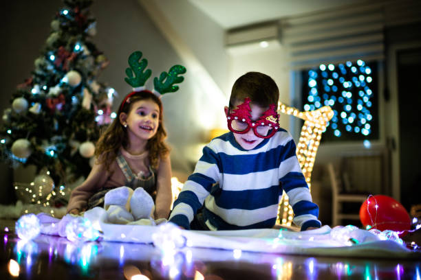 istock Happy children on Christmas Eve 1279948468