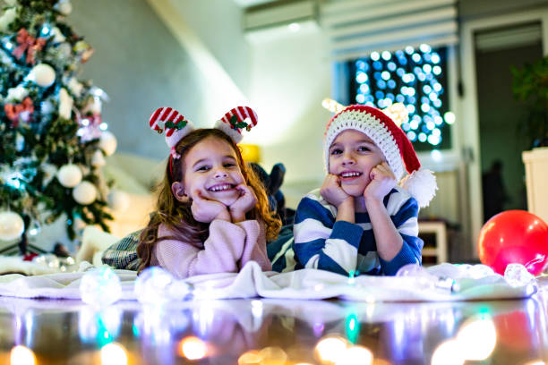 istock Happy children on Christmas Eve 1279948621