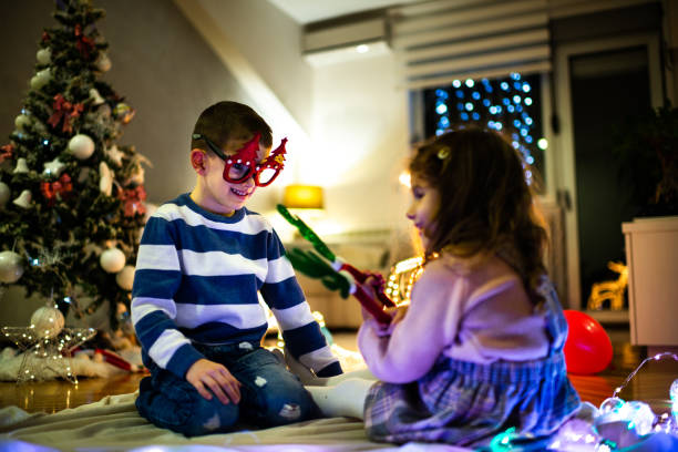 istock Happy children on Christmas Eve 1279949287