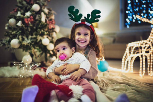 istock Happy children on Christmas Eve 1279949425