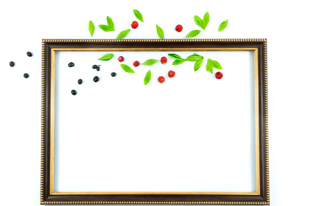 Autumn compositions wooden decorative frame and attributes of autumn, leaves and berries, as well as postcards with empty fields, on a white isolated background