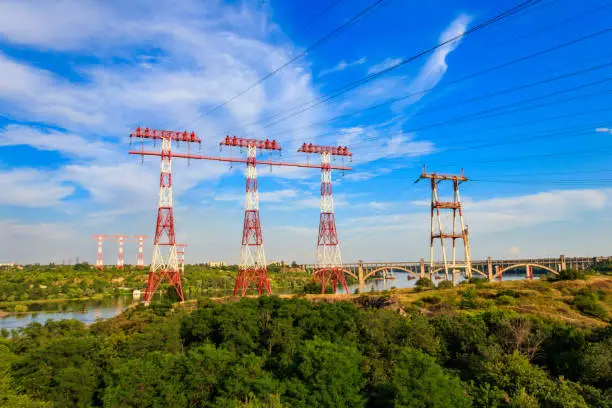 High voltage power line across the Dnieper river on Khortytsia island in Zaporizhia, Ukraine