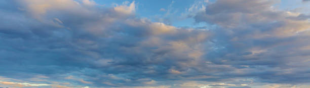 istock Dramatic colorful sky with afterglow and illuminated clouds 1279951985
