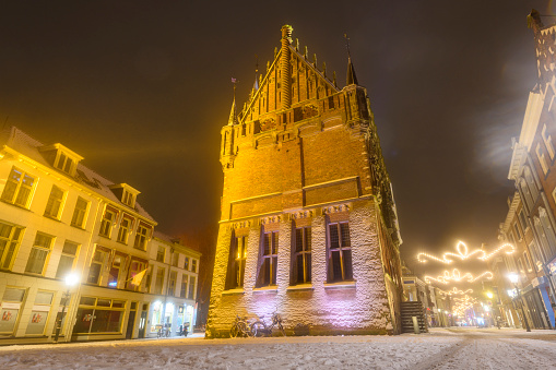 Gdansk, Poland - July 12, 2018: Architecture of Artus Court in Gdansk at night, Poland. Gdansk is the historical capital of Polish Pomerania with medieval old town architecture.