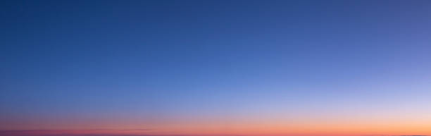 istock Dramatic colorful sky with afterglow and illuminated clouds 1279953666