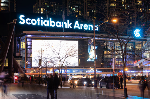 Front of Scotiabank Arena at night near game time for the Toronto Maple Leafs.