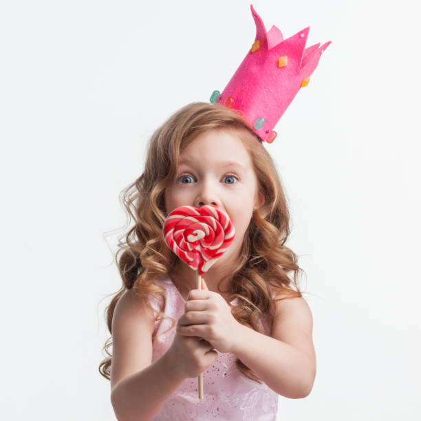 istock Candy princess girl with lollipop 1279956693