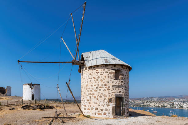 istock Old windmill in autumn sunny day 1279957967