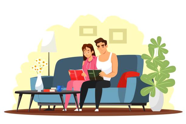 ilustrações de stock, clip art, desenhos animados e ícones de happy couple reading book at home. young family at house sitting on couch and reading together. love and romance at house vector illustration. modern interior design of living room - family sofa vector illustration and painting