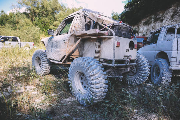 istock Offroad car in the swamp. Redesigned car for competitions. Custom buggy. Big wheels. 1279959397