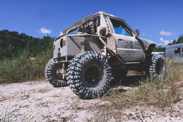 istock Offroad car in the swamp. Redesigned car for competitions. Custom buggy. Big wheels. 1279959406