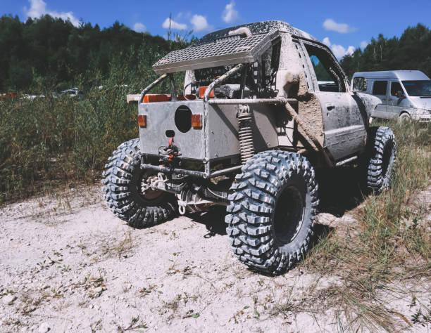 istock Offroad car in the swamp. Redesigned car for competitions. Custom buggy. Big wheels. 1279959420