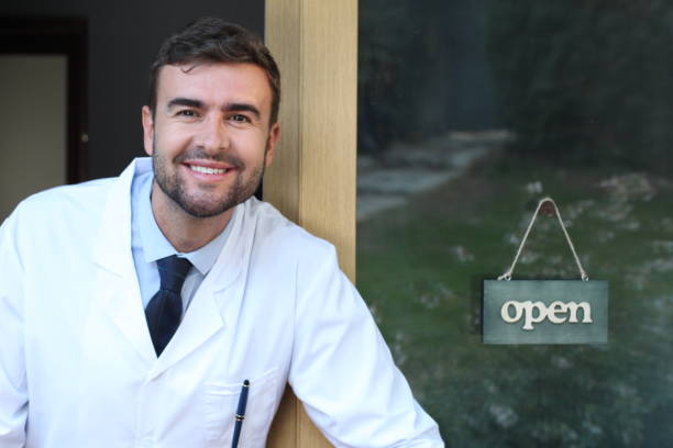 istock Gorgeous male doctor at the office 1279959694
