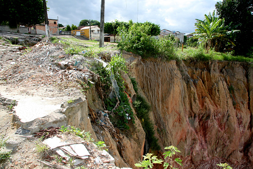 eunapolis, bahia / brazil - april 1, 2008: view of landslide area near houses in the city of Eunapolis, in southern Bahia.
