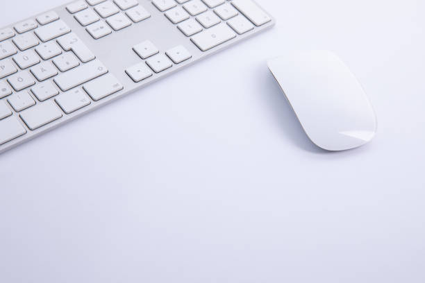 istock new modern keyboard with computer mouse isolated on white background, close view 1279970758