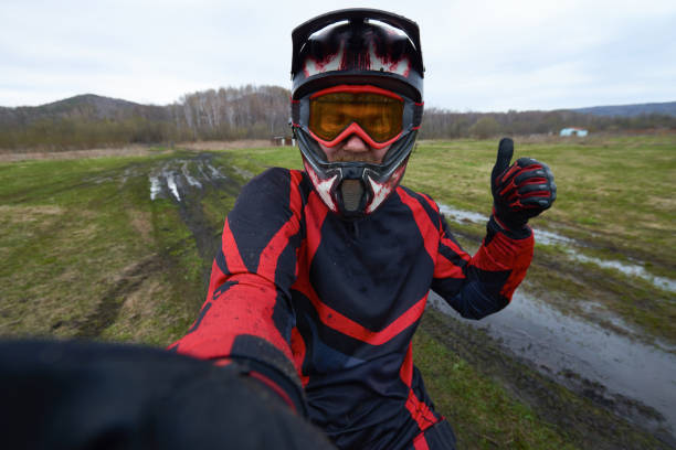 istock Motorcross rider posing for selfie 1279971539