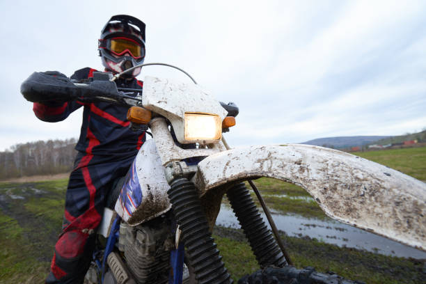 istock Motocross racing in the countryside 1279971565