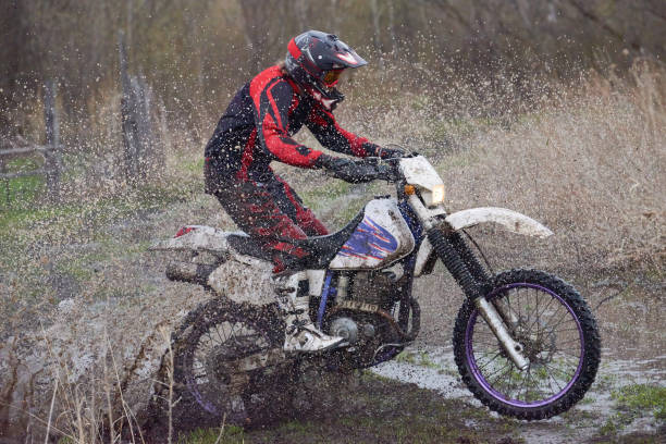 istock Motorcoss rider racing in the countryside 1279972054