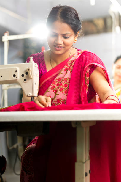 istock Indian woman textile worker on production line 1279974195