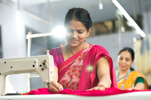 istock Indian woman textile worker on production line 1279974230