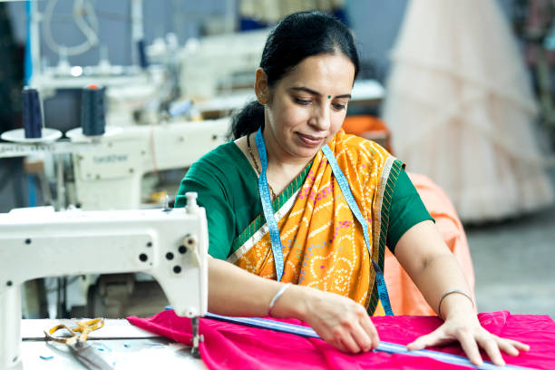 istock Woman textile worker on production line 1279975150