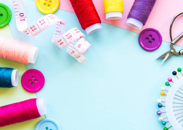 istock Sewing accessories on a blue pastel background 1279975491