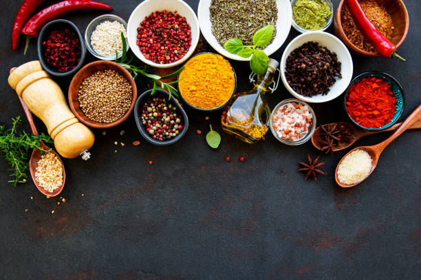 istock Assortment of spices on black 1279975513
