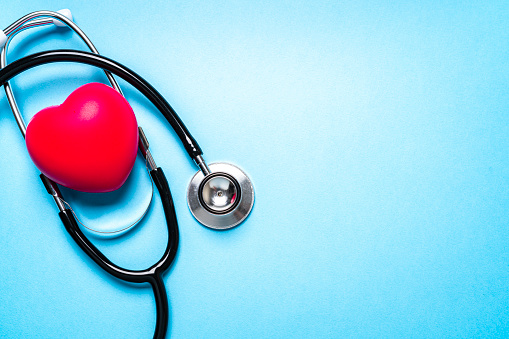 Health and medicine: top view of a medical stethoscope and a red heart shot on blue background. The composition is at the left of an horizontal frame leaving useful copy space for text and/or logo at the right.
High resolution 42Mp studio digital capture taken with SONY A7rII and Zeiss Batis 40mm F2.0 CF lens