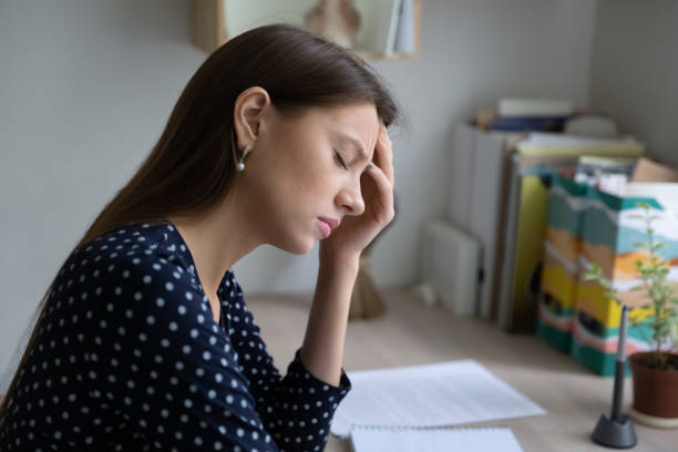 istock Unhappy tired woman suffering from overload working day. 1279977935