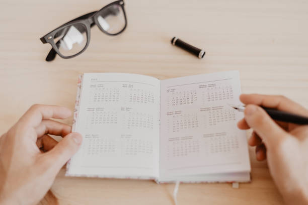 istock a man sitting at a desk plans the year 2021 1279979616