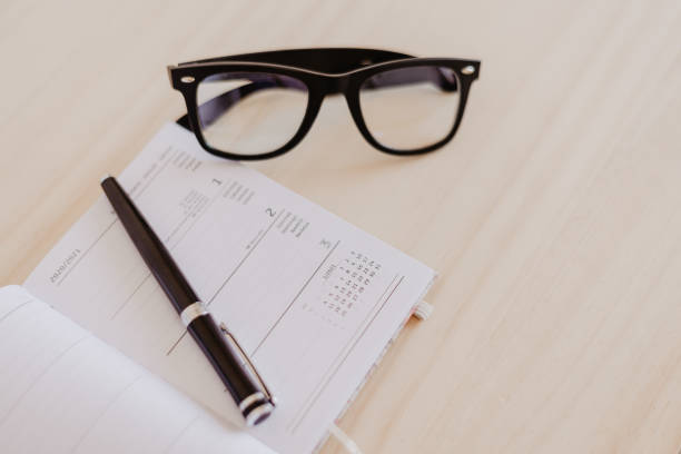 istock an open 2021 agenda on a wooden table 1279979633