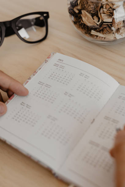 istock a man sitting at a desk plans the year 2021 1279979641