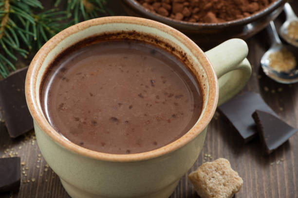 istock hot chocolate in a ceramic cup, top view, close-up 1279979944