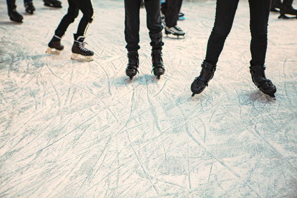 Ice rink Ice rink with skating people skater feet stock pictures, royalty-free photos & images