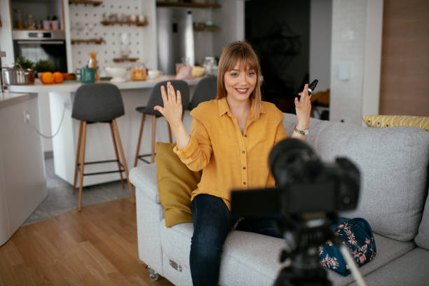 istock Young beautiful woman recording make up tutorial to share on social media. 1279983018