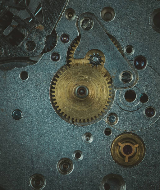 istock Vintage watch movement close - up. Selective focus on elements, macro photography. Background in steampunk style. Metallic grunge texture. Easy image tinting 1279984754