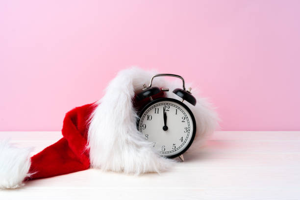 istock Christmas and New Year countdown concept with alarm clock 1279986667