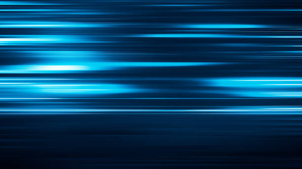 istock Glowing light stripes in motion over dark background. Luminous blurred lines moving fast. Flaring bright streaks. Abstract composition. 3d rendering 1279986990