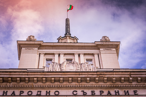 The Largo ensemble: National Assembly building and Bulgarian flag – Sofia, Bulgaria