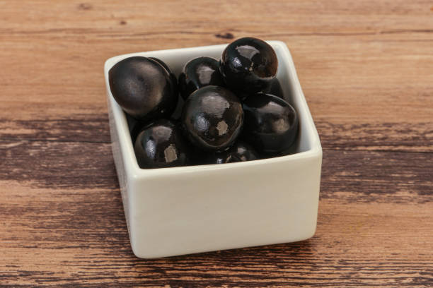 istock Black olives in the bowl 1279990544