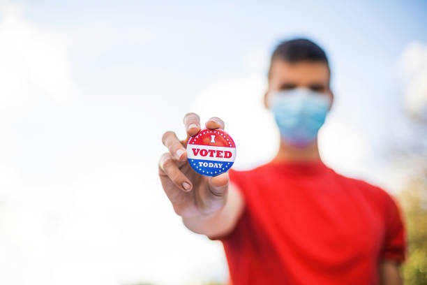 Man with I voted today badge
