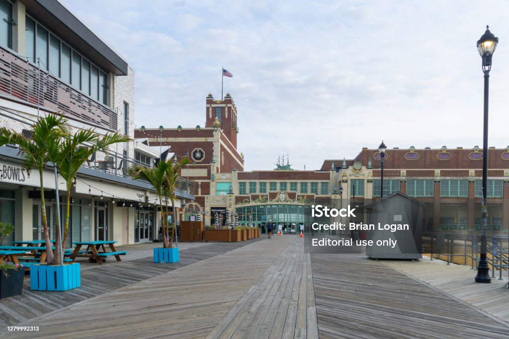 A scene of the Asbury Park boardwalk and the iconic convention center. Asbury Park, NJ / United States - Oct. 11, 2020: A scene of the Asbury Park boardwalk and the iconic convention center. Asbury Park Stock Photo