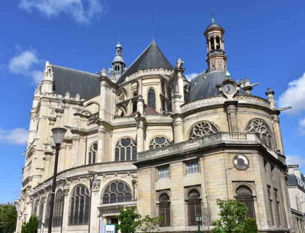 St. Eustatius Church at Les Halles neighborhood. Paris, France. Paris, France. Saint Eustache gothic church with blue sky. église saint eustache stock pictures, royalty-free photos & images
