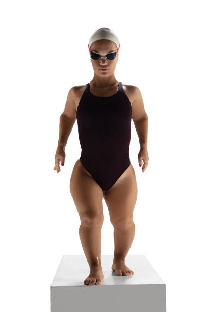 istock Beautiful dwarf woman practicing in swimming isolated on white background 1279994139