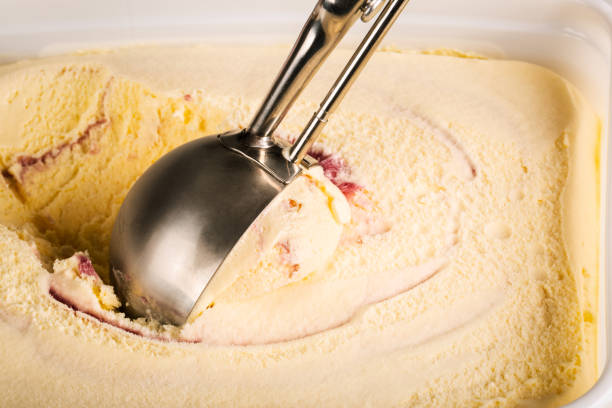 istock raspberry ripple ice cream being scooped up 1279996085