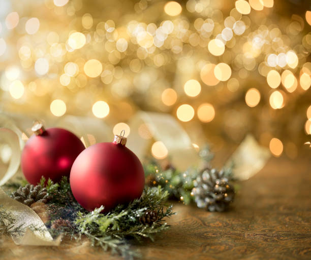 istock Christmas Red Baubles on a Defocused Gold Background 1279997133