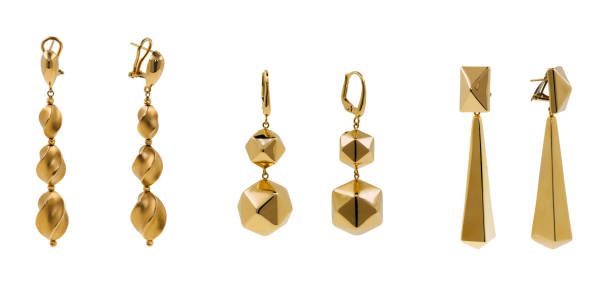 pairs of exclusive gold earrings on white - earring imagens e fotografias de stock