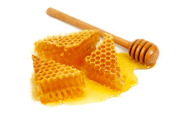istock Honeycomb and curative propolis isolated on white background. Wild bee honey 1280000379